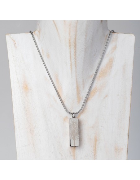 Cremation Jewell Tree Root Pendant necklace on a silver chain displayed against a light wooden stand