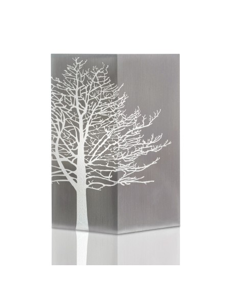 Cremation urn with a silver-gray finish featuring a white tree silhouette design along the side.